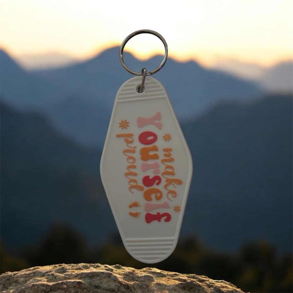 Inspirational White Keychain with Colorful Text